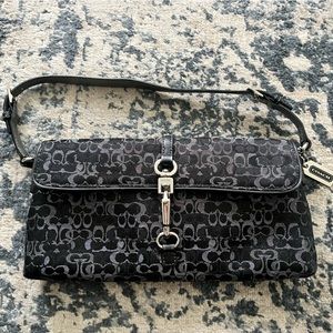 Coach holiday edition monogrammed wristlet/clutch